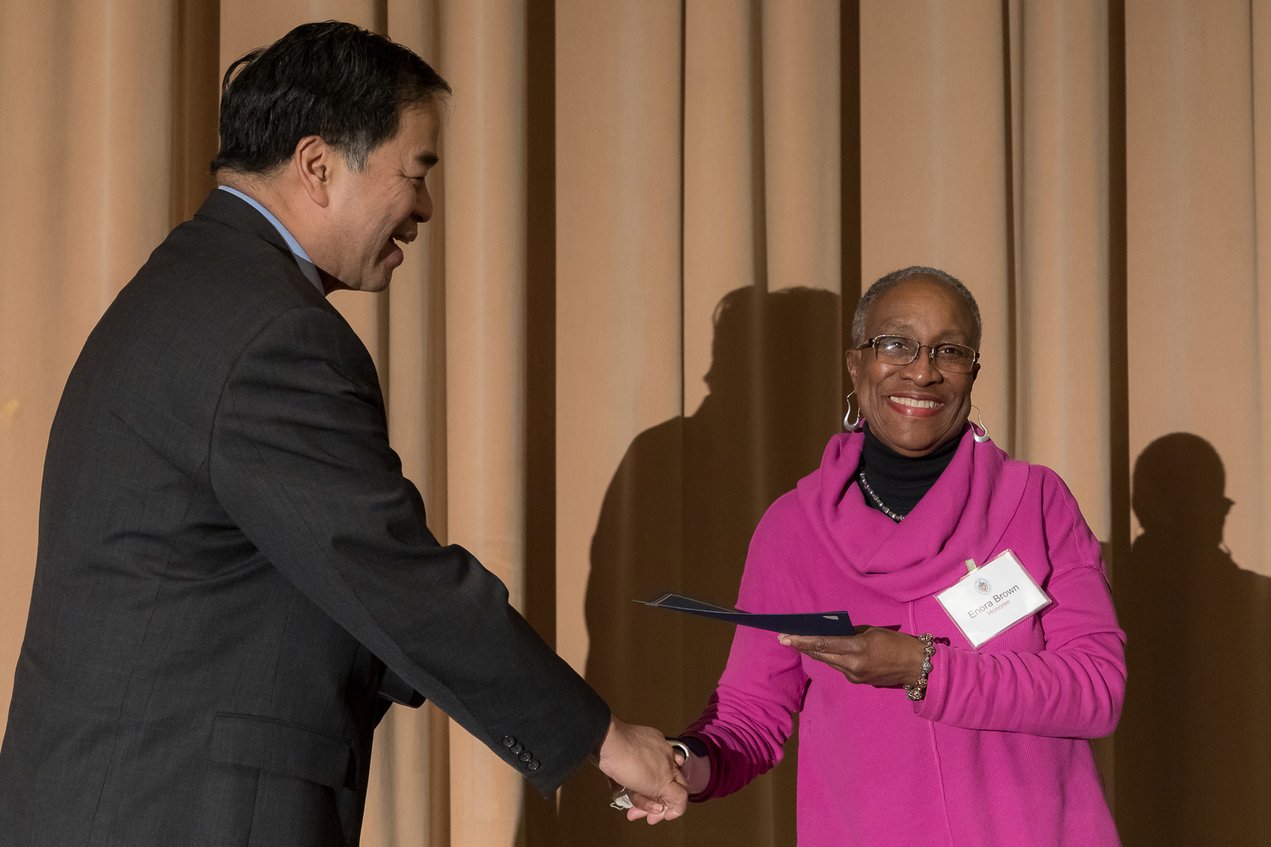 Enora Brown, right, with A. Gabriel Esteban, Ph.D., president, as faculty and staff members are inducted into DePaul University's 25 Year Club, Tuesday, Nov. 13, 2018, at the Lincoln Park Student Center. Employees celebrating their 25th work anniversary were honored at the luncheon with their colleagues and will have their names added to plaques located on the Loop and Lincoln Park Campuses. (DePaul University/Jeff Carrion)